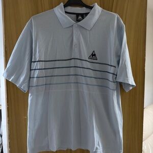 Le Coq Sportif Light Blue Polo with Navy Stripe Detail